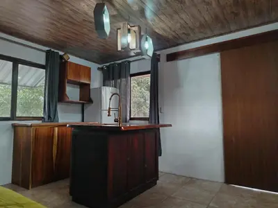 a kitchen with a sink and a counter top at Apartamento Roble Sabana in Tapantí