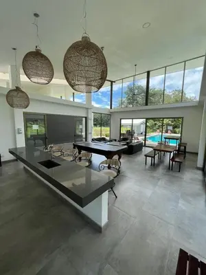 a large room with a ping pong table in it at Casa kai in Agujas