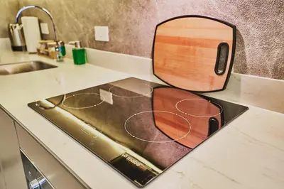 a mirror sitting on a counter next to a sink at Unique Industrial Apt Near Airport in La Sabana in San José