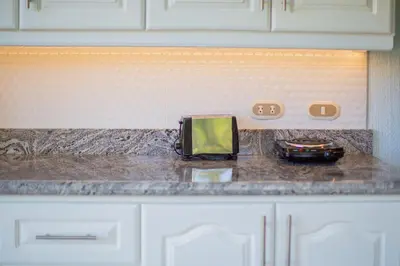 a toaster sitting on a counter in a kitchen at Romantic 1BR Studio Guesthouse with 3 Shared Pools, Beach and Resort Access in Ocotal