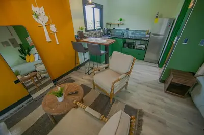 an overhead view of a living room with a kitchen at Refugio Verdanza-Luxury King Suite with Private Jacuzzi Balcony-5 min to La Fortuna in Fortuna