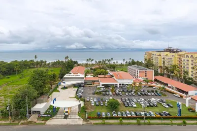 an aerial view of a parking lot at a resort at Viva Jaco in Jacó