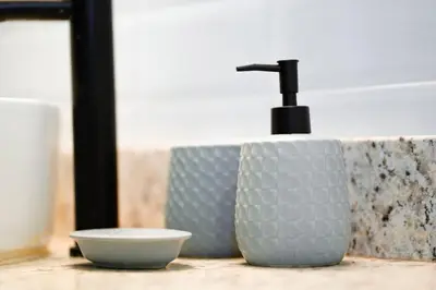 a bathroom sink with a faucet and a bowl at Blue 2BR 2BA 10 Min Beach Walk in Nosara