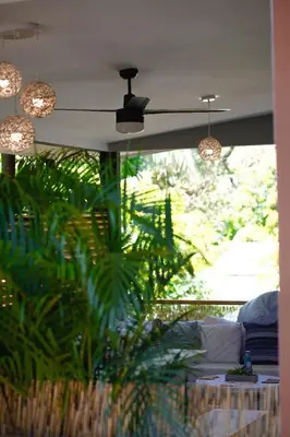 a living room with a ceiling with lights at Blue 2BR 2BA 10 Min Beach Walk in Nosara