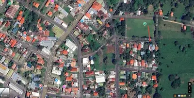 an overhead view of a city with houses and roads at Cabina Antigua Plaza in Tapantí
