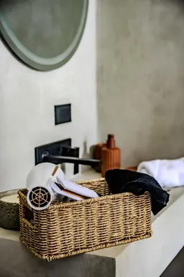 a wicker basket sitting on top of a table at Villa Bosque CR in Turrialba