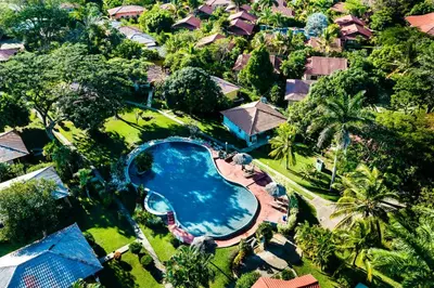 an overhead view of a swimming pool in a resort at Private Patio Villa, Pool Access near Playa Penca in Potrero