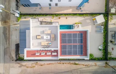 an aerial view of a house with a red door at Mirame #4 - 3 Bedroom Villa Across from the Beach in Coco