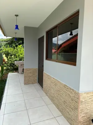 a view from the outside of a house with a window at Casa de descanso in San Pablo
