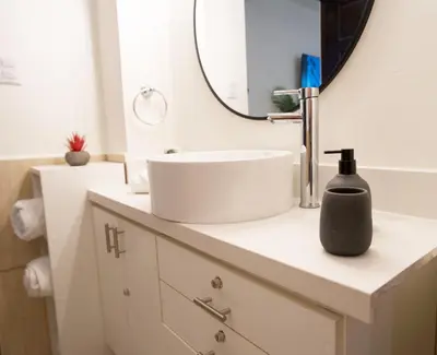 a bathroom with a sink and a mirror at Galeon House in San Rafael