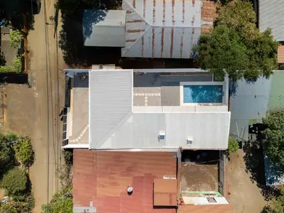 an overhead view of a house with a roof at Casa Aurora with Private Patio & Pool in Coco