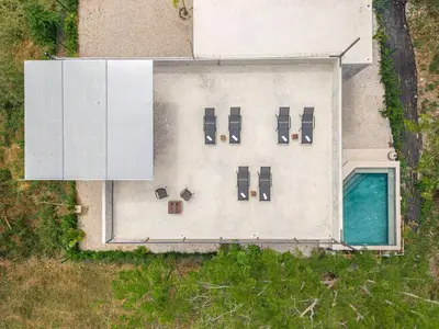 an overhead view of a building with a group of cars at Nelblu Flamingo Suites in Playa Flamingo