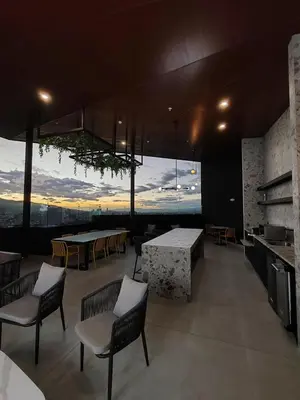 a room with chairs and a table with a view at Valle de Escalante in San José