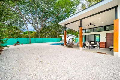 an exterior view of a house with a patio at Casa Montana Azul @ Catalina Cove in Brasilito