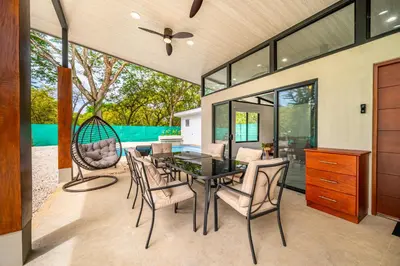 a dining room with a table and chairs at Casa Montana Azul @ Catalina Cove in Brasilito