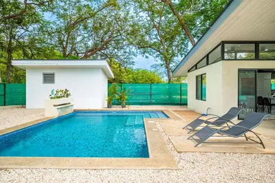 a swimming pool in the backyard of a house at Casa Montana Azul @ Catalina Cove in Brasilito