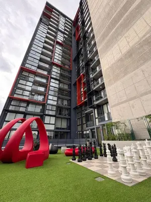 a large building with a giant chess board and a giant building at Excellent location, beautiful apartment in San José