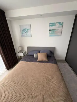 a bedroom with a large bed in a room at Excellent location, beautiful apartment in San José
