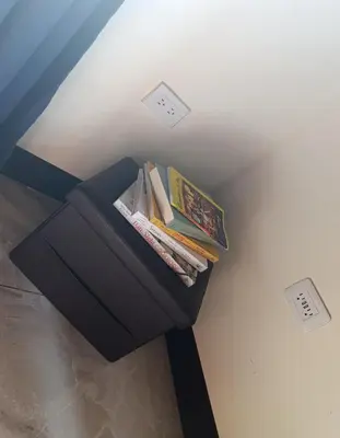 a pile of books sitting on top of a table at Quinta Rincon Silvestre cerca de Volcán in Jabillos