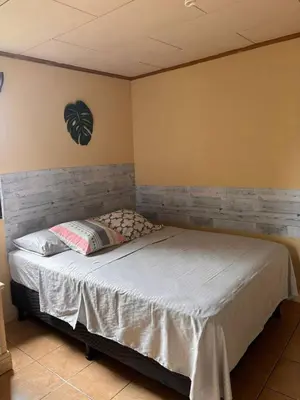 a bedroom with a bed in a room at Vista Serena in San Isidro