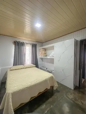 a bedroom with a bed in a room at Blanca's House in Fortuna