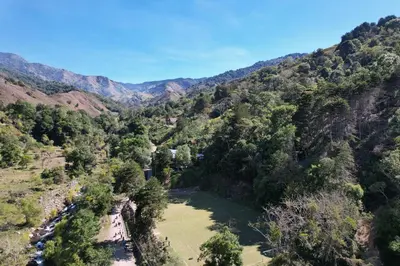 an aerial view of a valley in the mountains at Route to Cerro Urán - Chirripó in Rivas