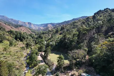 an aerial view of a valley in the mountains at Route to Cerro Urán - Chirripó in Rivas