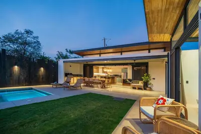 a house with a backyard with a swimming pool at Casa Avellanas in Playa Avellana