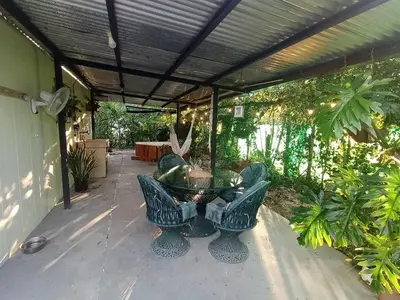 a patio with a fountain and a table with chairs at Casa Mares in Lepanto