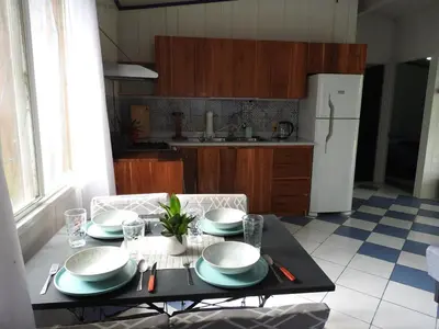 a kitchen with a table with plates on it at Casa Mares in Lepanto
