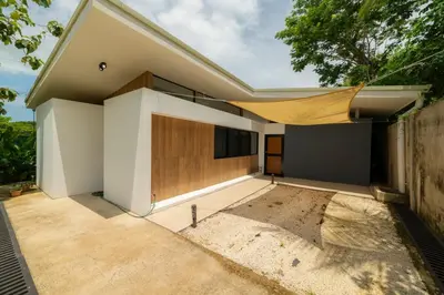a house that is being built with a roof at Casa Tatala - 2bdr home with pool near Santa Teresa beach in Boca de Ario