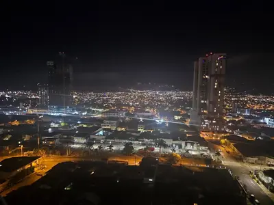 a view of a city at night with lights at Chic Studio in Barrio Escalante in Tapantí