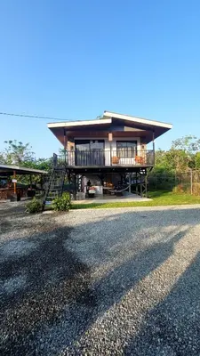a house on the side of a road at Marlin Vacations Home in Savegre
