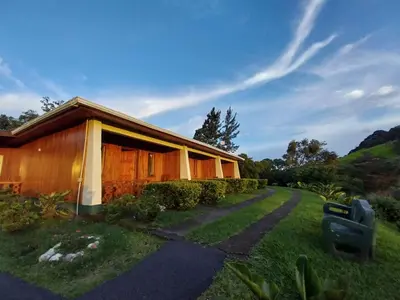 a small house with a pathway leading to it at Belcruz family lodge in Monteverde Costa Rica