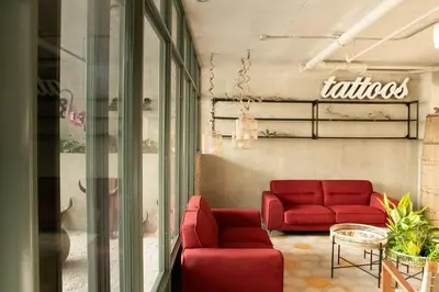 a store with two red couches in a room at Vista Aqua Escalante in San José