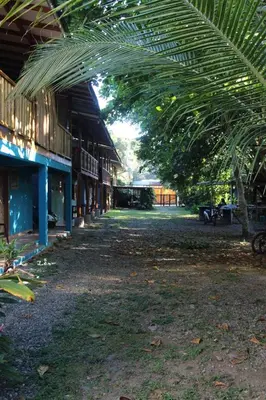 an empty building with a large roof over a courtyard at Brisas del Caribe 3 in Tapantí