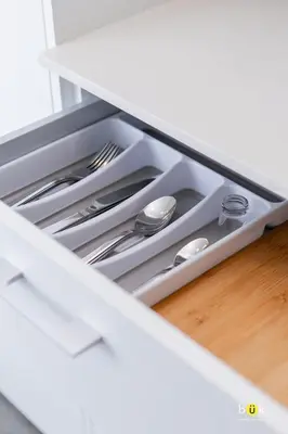 an open drawer with silver utensils in a kitchen at Horizonte 28 Escalante in San José