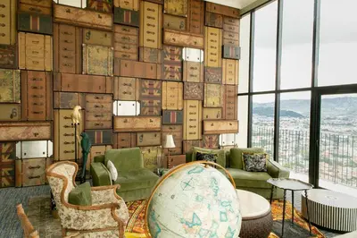 a living room with a wall of boxes at Horizonte 28 Escalante in San José