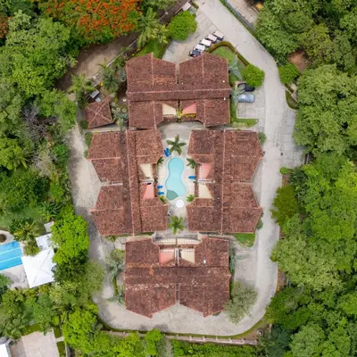 an overhead view of a brick building with a yard at The Cove Door 16 2 Bedroom Upper Unit in Ocotal