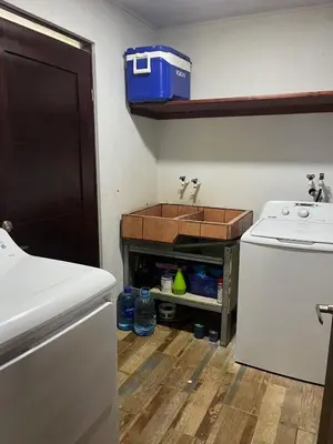 a small kitchen with a sink and a counter at Nature, Peace & Tranquility in Northern Costa Rica in Santa Rita