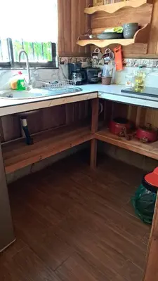 a kitchen with a sink and a counter top at Cabaña Nosara in Santa Cruz