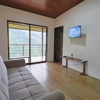 VILLA SANTA LUCÍA in front of the waterfall with a mountain view