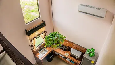 an overhead view of a bathroom with a sink at Toucan Villa Rio Cuarto in Río Cuarto