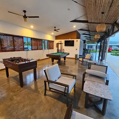 a living room filled with furniture and a pool table at A short walk from the sea - 2 bedrooms - 2 beds - 2 bathrooms in Jacó