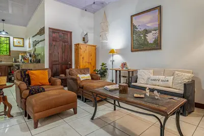 a living room with couches and a coffee table at Tiburon Galano - Playa Carrillo in Carrillo