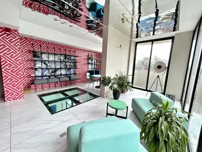 a living room with a couch and a fireplace at Luxurious 9th floor apartment in Vuelta del Virilla