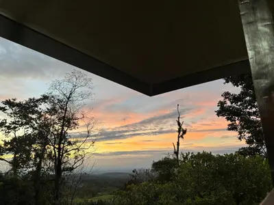 a view of a sunset from a house at Rancho and Modern Rustic House with a Valley View in Venecia