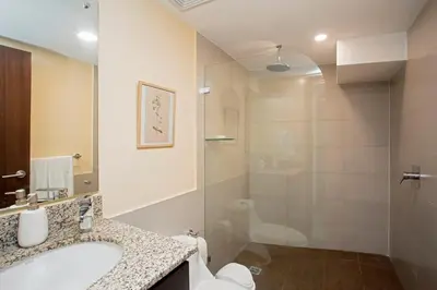a bathroom with a sink and a shower at Luxury Escape 1 Bedroom & 1 Bathroom c404 Tly in San José