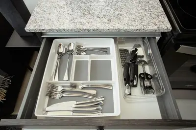 a drawer filled with silver utensils in a kitchen at Luxury Escape 1 Bedroom & 1 Bathroom c404 Tly in San José