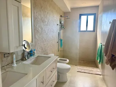 a bathroom with a sink and a toilet and a shower at Villa Dorada 55 in Marbella